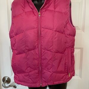 Hot pink puffer vest. Great for skiing. Size 6
